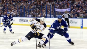 Nov 10, 2015; Tampa, FL, USA; Buffalo Sabres left wing Tyler Ennis (63) skates with the puck as Tampa Bay Lightning defenseman Anton Stralman (6) defends during the first period at Amalie Arena. Mandatory Credit: Kim Klement-USA TODAY Sports