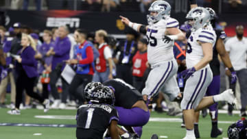 ARLINGTON, TEXAS - DECEMBER 03: Cornerback Tre'Vius Hodges-Tomlinson #1 of the TCU Horned Frogs sits on the field after the game against the Kansas State Wildcats at AT&T Stadium on December 03, 2022 in Arlington, Texas. (Photo by Tim Heitman/Getty Images)
