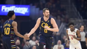 Cleveland Cavaliers guard Darius Garland (#10) celebrates with Cleveland big man Kevin Love (#0) in-game. (Photo by Jason Miller/Getty Images)