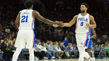 Dec 2, 2016; Philadelphia, PA, USA; Philadelphia 76ers center Joel Embiid (21) and center Jahlil Okafor (8) congratulate each other after a score against the Orlando Magic during the second quarter at Wells Fargo Center. Mandatory Credit: Bill Streicher-USA TODAY Sports