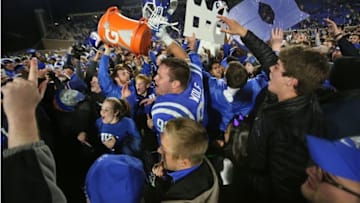 Nov 10, 2016; Durham, NC, USA; Duke Blue Devils defensive tackle A.J. Wolf (93) celebrates with fans after beating the North Carolina Tar Heels 28-27 at Wallace Wade Stadium. Mandatory Credit: Mark Dolejs-USA TODAY Sports