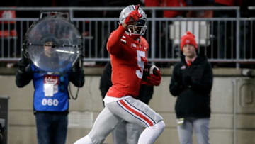 Ohio State Buckeyes wide receiver Garrett Wilson (5) runs for a touchdown in the second quarter of Saturday's NCAA Division I football game against the Purdue Boilermakers at Ohio Stadium in Columbus, Oh., on November 13, 2021.Osu21pur Bjp 685