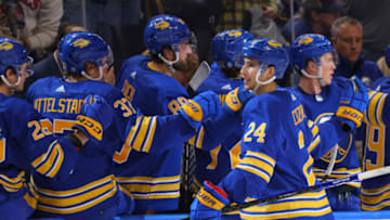 Oct 27, 2022; Buffalo, New York, USA; Buffalo Sabres center Dylan Cozens (24) celebrates his goal with teammates during the third period against the Montreal Canadiens at KeyBank Center. Mandatory Credit: Timothy T. Ludwig-USA TODAY Sports