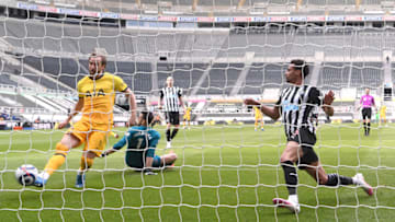NEWCASTLE UPON TYNE, ENGLAND - APRIL 04: Harry Kane of Tottenham Hotspur scores their team's first goal during the Premier League match between Newcastle United and Tottenham Hotspur at St. James Park on April 04, 2021 in Newcastle upon Tyne, England. Sporting stadiums around the UK remain under strict restrictions due to the Coronavirus Pandemic as Government social distancing laws prohibit fans inside venues resulting in games being played behind closed doors. (Photo by Stu Forster/Getty Images)