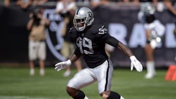 Sep 20, 2015; Oakland, CA, USA; Oakland Raiders defensive end Aldon Smith (99) against the Baltimore Ravens at O.co Coliseum. Mandatory Credit: Kirby Lee-USA TODAY Sports