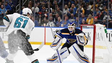 ST. LOUIS, MO - NOVEMBER 09: St. Louis Blues goalie Chad Johnson (31) blocks a shot by San Jose Sharks defenseman Justin Braun (61) during a NHL game game between the San Jose Sharks and the St. Louis Blues on November 9, 2018, at Enterprise Center, St. Louis, MO. (Photo by Keith Gillett/Icon Sportswire via Getty Images)
