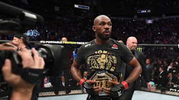 HOUSTON, TEXAS - FEBRUARY 08: Jon Jones celebrates his victory over Dominick Reyes in their light heavyweight championship bout during the UFC 247 event at Toyota Center on February 08, 2020 in Houston, Texas. (Photo by Josh Hedges/Zuffa LLC via Getty Images)