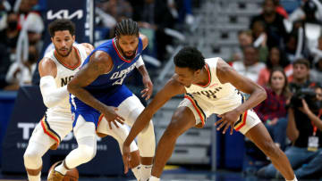 Herbert Jones #5 of the New Orleans Pelicans strips the ball from Paul George #13 of the LA Clippers . (Photo by Sean Gardner/Getty Images)