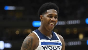 SALT LAKE CITY, UTAH - DECEMBER 23: Nathan Knight #13 of the Minnesota Timberwolves reacts to a play in the first half of a game against the Utah Jazz at Vivint Smart Home Arena on December 23, 2021 in Salt Lake City, Utah. NOTE TO USER: User expressly acknowledges and agrees that, by downloading and or using this photograph, User is consenting to the terms and conditions of the Getty Images License Agreement. (Photo by Alex Goodlett/Getty Images)