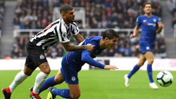 NEWCASTLE UPON TYNE, ENGLAND - AUGUST 26: Alvaro Morata of Chelsea is fouled by Deandre Yedlin of Newcastle United during the Premier League match between Newcastle United and Chelsea FC at St. James Park on August 26, 2018 in Newcastle upon Tyne, United Kingdom. (Photo by Stu Forster/Getty Images)