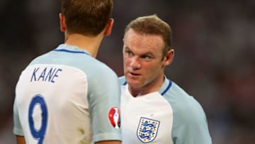 MARSEILLE, FRANCE - JUNE 11: Wayne Rooney (R) and Harry Kane (L) of England talk before a free kick during the UEFA EURO 2016 Group B match between England and Russia at Stade Velodrome on June 11, 2016 in Marseille, France. (Photo by Lars Baron/Getty Images)