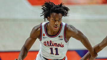 CHAMPAIGN, IL - JANUARY 02: Ayo Dosunmu #11 of the Illinois Fighting Illini brings the ball up court during the game against the Purdue Boilermakers at State Farm Center on January 2, 2021 in Champaign, Illinois. (Photo by Michael Hickey/Getty Images)