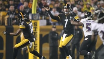Jan 3, 2015; Pittsburgh, PA, USA; Pittsburgh Steelers quarterback Ben Roethlisberger (7) throws the ball to Steelers wide receiver Markus Wheaton (11) during the first quarter of the 2014 AFC Wild Card playoff football game against the Baltimore Ravens at Heinz Field. Mandatory Credit: Jason Bridge-USA TODAY Sports
