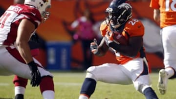 Oct 5, 2014; Denver, CO, USA; Denver Broncos running back Montee Ball (28) runs the ball during the first half against the Arizona Cardinals at Sports Authority Field at Mile High. Mandatory Credit: Chris Humphreys-USA TODAY Sports