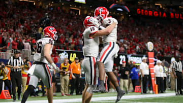 Brock Bowers celebrates after a touchdown with running back Zamir White. (Mandatory Credit: Brett Davis-USA TODAY Sports)