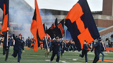 CHAMPAIGN, IL - NOVEMBER 11: Illinois cheerleaders lead the team on to the field before a Big Ten Conference football game between the Indiana Hoosiers and the University of Illinois Fighting Illini on November 11, 2017, at Memorial Stadium, Champaign, IL. (Photo by Keith Gillett/Icon Sportswire via Getty Images)