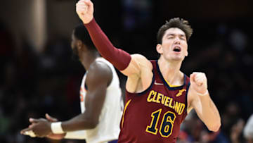 Nov 24, 2021; Cleveland, Ohio, USA; Cleveland Cavaliers forward Cedi Osman (16) reacts after hitting a three point basket during the second half against the Phoenix Suns at Rocket Mortgage FieldHouse. Mandatory Credit: Ken Blaze-USA TODAY Sports