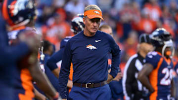 DENVER, CO - OCTOBER 15: Offensive coordinator Mike McCoy stands not he field as players warm up before a game between the Denver Broncos and the New York Giants at Sports Authority Field at Mile High on October 15, 2017 in Denver, Colorado. (Photo by Dustin Bradford/Getty Images)