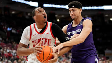 Feb 9, 2023; Columbus, OH, USA; Ohio State Buckeyes forward Zed Key (23) muscles through Northwestern Wildcats forward Tydus Verhoeven (10) during the first half of the NCAA men’s basketball game at Value City Arena. Mandatory Credit: Adam Cairns-The Columbus DispatchBasketball Ceb Mbk Northwestern Northwestern At Ohio State
