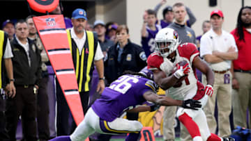 MINNEAPOLIS, MN - NOVEMBER 20: David Johnson #31 of the Arizona Cardinals is tackled by Trae Waynes #26 of the Minnesota Vikings while carrying the ball in the second half of the game on November 20, 2016 at US Bank Stadium in Minneapolis, Minnesota. (Photo by Adam Bettcher/Getty Images)