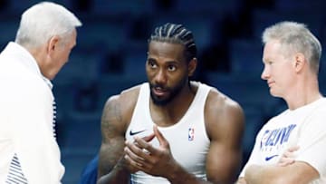 OKC Thunder Team Preview, Jerry West talk with Kawhi Leonard #2, (Photo by Chris Elise/NBAE via Getty Images)