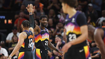 PHOENIX, ARIZONA - MAY 04: Deandre Ayton #22 of the Phoenix Suns high fives Ish Wainright #12 after scoring against the Dallas Mavericks during the second half of Game Two of the Western Conference Second Round NBA Playoffs at Footprint Center on May 04, 2022 in Phoenix, Arizona. The Suns defeated the Mavericks 129-109. NOTE TO USER: User expressly acknowledges and agrees that, by downloading and or using this photograph, User is consenting to the terms and conditions of the Getty Images License Agreement. (Photo by Christian Petersen/Getty Images)