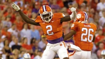 Sep 27, 2014; Clemson, SC, USA; Clemson Tigers cornerback MacKensie Alexander (2) and cornerback Garry Peters (26) celebrate after breaking up a pass during the first quarter against the North Carolina Tar Heels at Clemson Memorial Stadium. Mandatory Credit: Joshua S. Kelly-USA TODAY Sports