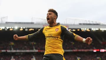MANCHESTER, ENGLAND - NOVEMBER 19: Alex Oxlade-Chamberlain of Arsenal celebrates his sides first goal during the Premier League match between Manchester United and Arsenal at Old Trafford on November 19, 2016 in Manchester, England. (Photo by Michael Regan/Getty Images)