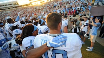 Oct 1, 2016; Tallahassee, FL, USA; North Carolina Tarheels players including quarterback Mitch Trubisky (10) celebrate after the win against the Florida State Seminoles at Doak Campbell Stadium. Mandatory Credit: Melina Vastola-USA TODAY Sports