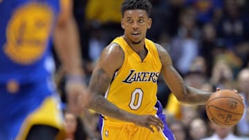 Oct 19, 2016; San Diego, CA, USA; Los Angeles Lakers forward Nick Young (0) brings the ball up against the Golden State Warriors during the third quarter at Valley View Casino Center. Mandatory Credit: Jake Roth-USA TODAY Sports
