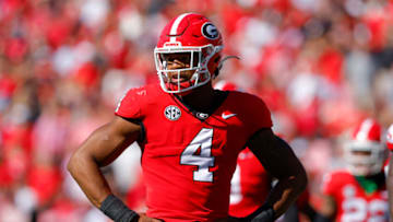 ATHENS, GA - OCTOBER 08: Nolan Smith #4 of the Georgia Bulldogs looks to the sideline in the first half against the Auburn Tigers at Sanford Stadium on October 8, 2022 in Athens, Georgia. (Photo by Todd Kirkland/Getty Images)