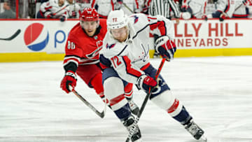 RALEIGH, NC - SEPTEMBER 29: Carolina Hurricanes left wing Teuvo Teravainen (86) chases down Washington Capitals center Travis Boyd (72) during an NHL Preseason game between the Washington Capitals and the Carolina Hurricanes on September 29, 2019 at the PNC Arena in Raleigh, NC. (Photo by Greg Thompson/Icon Sportswire via Getty Images)