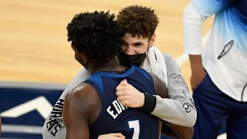 MINNEAPOLIS, MINNESOTA - MARCH 03: Anthony Edwards #1 of the Minnesota Timberwolves hugs LaMelo Ball #2 of the Charlotte Hornets after the game at Target Center on March 3, 2021 in Minneapolis, Minnesota. The Hornets defeated the Timberwolves 135-102. NOTE TO USER: User expressly acknowledges and agrees that, by downloading and or using this Photograph, user is consenting to the terms and conditions of the Getty Images License Agreement (Photo by Hannah Foslien/Getty Images)