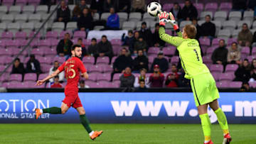GENEVA, SWITZERLAND - MARCH 26: Bruno Fernandes of Portugal and Jasper Cillessen of Netherlands during the International Friendly match between Portugal v Netherlands at Stade de Geneve on March 26, 2018 in Geneva, Switzerland. (Photo by Harold Cunningham/Getty Images)