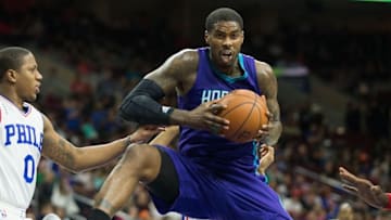 Mar 29, 2016; Philadelphia, PA, USA; Charlotte Hornets forward Marvin Williams (2) rebounds the ball in front of Philadelphia 76ers guard Isaiah Canaan (0) during the second quarter at Wells Fargo Center. Mandatory Credit: Bill Streicher-USA TODAY Sports