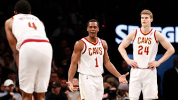 NEW YORK, NEW YORK - APRIL 12: Evan Mobley #4, Rajon Rondo #1, and Lauri Markkanen #24 of the Cleveland Cavaliers react during the second half of the Eastern Conference 2022 Play-In Tournament against the Brooklyn Nets at Barclays Center on April 12, 2022 in the Brooklyn borough of New York City. The Nets won 115-108. NOTE TO USER: User expressly acknowledges and agrees that, by downloading and or using this photograph, User is consenting to the terms and conditions of the Getty Images License Agreement. (Photo by Sarah Stier/Getty Images)