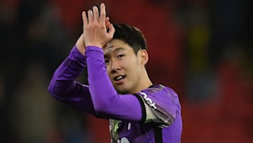 Tottenham Hotspur's South Korean striker Son Heung-Min reacts at the final whistle during the English Premier League football match between Watford and Tottenham Hotspur at Vicarage Road Stadium in Watford, southeast England, on January 1, 2022. - RESTRICTED TO EDITORIAL USE. No use with unauthorized audio, video, data, fixture lists, club/league logos or 'live' services. Online in-match use limited to 120 images. An additional 40 images may be used in extra time. No video emulation. Social media in-match use limited to 120 images. An additional 40 images may be used in extra time. No use in betting publications, games or single club/league/player publications. (Photo by Glyn KIRK / AFP) / RESTRICTED TO EDITORIAL USE. No use with unauthorized audio, video, data, fixture lists, club/league logos or 'live' services. Online in-match use limited to 120 images. An additional 40 images may be used in extra time. No video emulation. Social media in-match use limited to 120 images. An additional 40 images may be used in extra time. No use in betting publications, games or single club/league/player publications. / RESTRICTED TO EDITORIAL USE. No use with unauthorized audio, video, data, fixture lists, club/league logos or 'live' services. Online in-match use limited to 120 images. An additional 40 images may be used in extra time. No video emulation. Social media in-match use limited to 120 images. An additional 40 images may be used in extra time. No use in betting publications, games or single club/league/player publications. (Photo by GLYN KIRK/AFP via Getty Images)