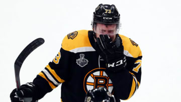 BOSTON, MASSACHUSETTS - JUNE 12: Charlie McAvoy #73 of the Boston Bruins reacts after his teams defeat to the St. Louis Blues in Game Seven of the 2019 NHL Stanley Cup Final at TD Garden on June 12, 2019 in Boston, Massachusetts. (Photo by Adam Glanzman/Getty Images)