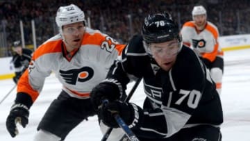 Jan 2, 2016; Los Angeles, CA, USA; Philadelphia Flyers defenseman Luke Schenn (22) and Los Angeles Kings left wing Tanner Pearson (70) chase down the puck in the second period of the game at Staples Center. Mandatory Credit: Jayne Kamin-Oncea-USA TODAY Sports