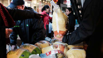 NEW YORK, NY - NOVEMBER 20: New Yorkers receive special Thanksgiving groceries, including a turkey, at the Reaching Out Community Services food pantry on November 20, 2017 in the Brooklyn borough of New York City. The popular Brooklyn food pantry feeds over 4,000 New Yorkers per month while offering a host of other services for those in need. (Photo by Spencer Platt/Getty Images)