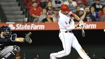 May 6, 2016; Anaheim, CA, USA; Los Angeles Angels shortstop Andrelton Simmons (2) singles to center during the eighth inning against the Tampa Bay Rays at Angel Stadium of Anaheim. Mandatory Credit: Richard Mackson-USA TODAY Sports