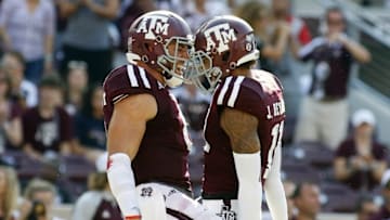 Sep 3, 2016; College Station, TX, USA; Texas A&M Aggies quarterback Trevor Knight (8) and wide receiver Josh Reynolds (11) react to their 40-yard touchdown against the UCLA Bruins during the second half at Kyle Field. Texas A&M won in overtime 31-24. Mandatory Credit: Ray Carlin-USA TODAY Sports