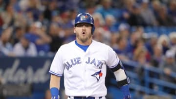 TORONTO, ON - MAY 12: Josh Donaldson #20 of the Toronto Blue Jays reacts after fouling a ball off his leg in the first inning during MLB game action against the Boston Red Sox at Rogers Centre on May 12, 2018 in Toronto, Canada. (Photo by Tom Szczerbowski/Getty Images)