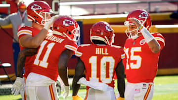 Nov 1, 2020; Kansas City, Missouri, USA; Kansas City Chiefs wide receiver Demarcus Robinson (11) is congratulated by quarterback Patrick Mahomes (15) and tight end Nick Keizer (48) and wide receiver Tyreek Hill (10) after scoring a touchdown against the New York Jets during the second half at Arrowhead Stadium. Mandatory Credit: Jay Biggerstaff-USA TODAY Sports
