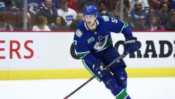 VANCOUVER, BC - OCTOBER 15: Tyler Myers #57 of the Vancouver Canucks skates up ice during their NHL game against the Detroit Red Wings at Rogers Arena October 15, 2019 in Vancouver, British Columbia, Canada. (Photo by Jeff Vinnick/NHLI via Getty Images)"n