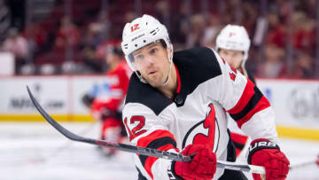 CHICAGO, IL - FEBRUARY 14: New Jersey Devils defenseman Ben Lovejoy (12) warms up prior to a game against the Chicago Blackhawks on February 14, 2019, at the United Center in Chicago, IL. (Photo by Patrick Gorski/Icon Sportswire via Getty Images)