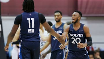 LAS VEGAS, NEVADA - JULY 10: Naz Reid #11 of the Minnesota Timberwolves celebrates with Josh Okogie #20. (Photo by Michael Reaves/Getty Images)
