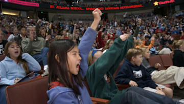 Geraldine Wilkins x65652   076715.ME.0126.ducks1.GAWArroyo elementary school fifth grader Nicole Tanaka(cq), 10 cheers for the Mighty Ducks at the Mighty Ducks Fourth Annual First Flight Field Trip, an interactive educational experience that combines professional hockey excitement with challenging educational concepts. The event was held at the Pond in Anaheim on Monday Jan 26, 2003