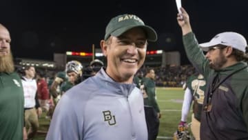 Oct 19, 2013; Waco, TX, USA; Baylor Bears head coach Art Briles celebrates the win over the Iowa State Cyclones at Floyd Casey Stadium. The Bears defeated the Cyclones 71-7. Mandatory Credit: Jerome Miron-USA TODAY Sports