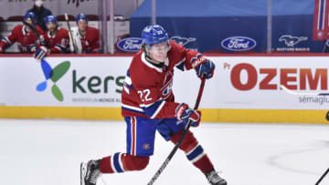 MONTREAL, QC - MAY 03: Cole Caufield #22 of the Montreal Canadiens takes a shot and scores the game winning goal for a final score of 3-2 against the Toronto Maple Leafs in overtime at the Bell Centre on May 3, 2021 in Montreal, Canada. (Photo by Minas Panagiotakis/Getty Images)
